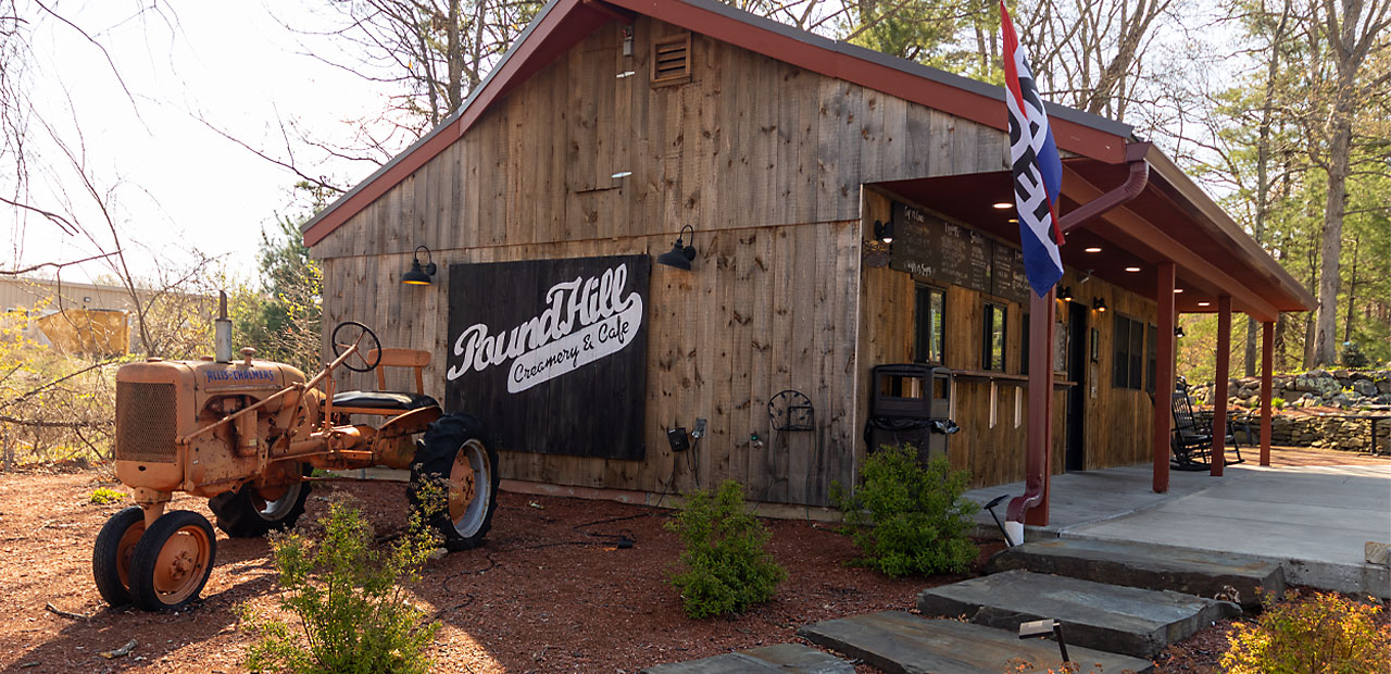 Antique tractor parked outside the Pound Hill Creamery Cafe