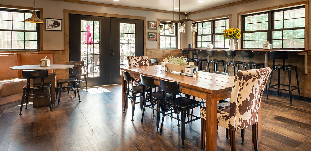 Seating areas inside the Pound Hill Creamery Cafe