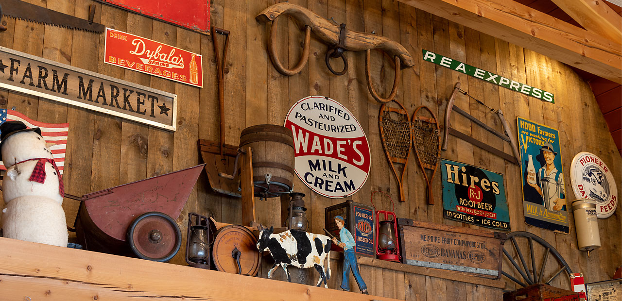 Antique signs and memorabilia above the cooking hearth