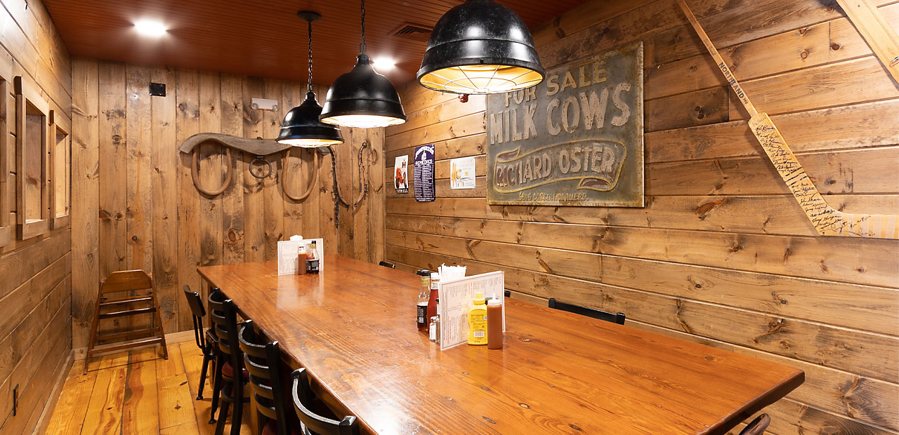 Semi private dining room with a table that seats up to 12 guests